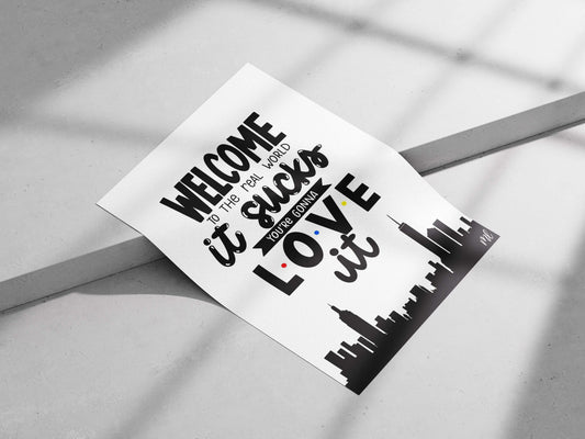 The motivational text phrase "WELCOME TO THE REAL WORLD it sucks YOU'RE GONNA LOVE it" Main Subject: The motivational text