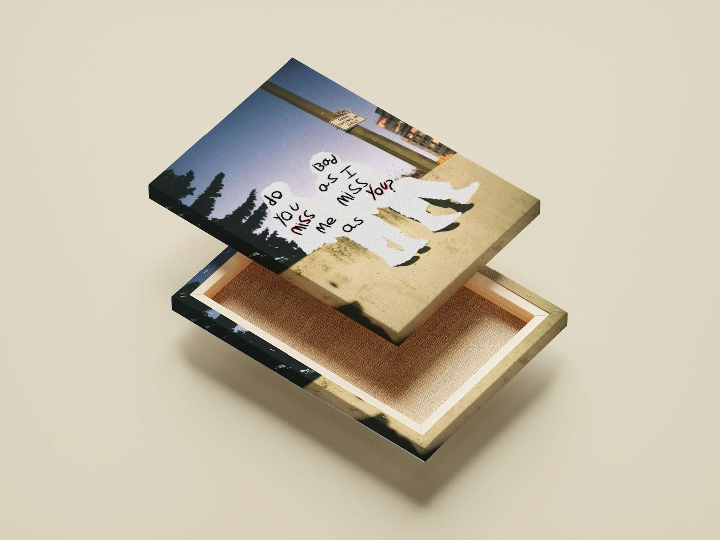 the phrase "do you miss me as I miss you?" written on two human silhouettes Main Subject: the phrase "do you miss me as I