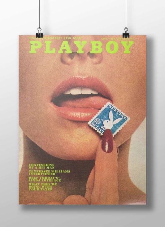 Close-up of a person's face with a hand holding a Playboy-branded stamp near the lips,