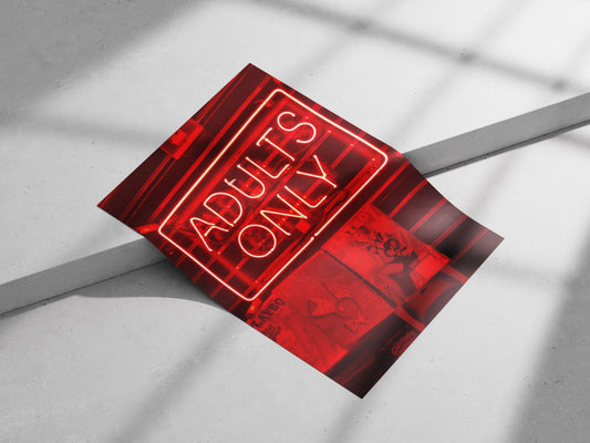 Red neon sign reading "ADULTS ONLY" mounted above PlayboY magazine covers Red Neon Adults Only