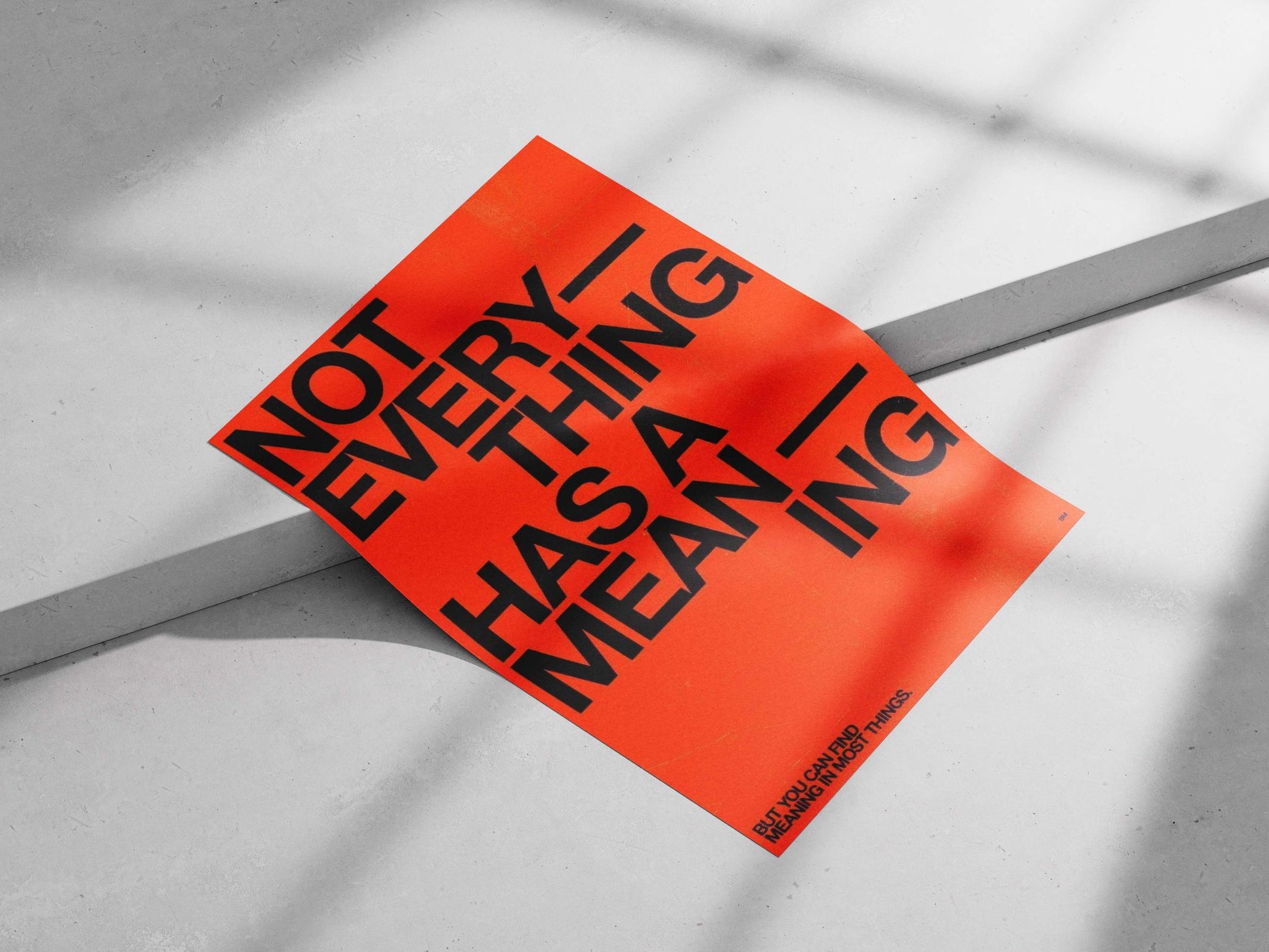 The phrase "NOT EVERYTHING HAS A MEANING — BUT YOU CAN FIND MEANING IN MOST THINGS." Main Subject: The phrase "NOT