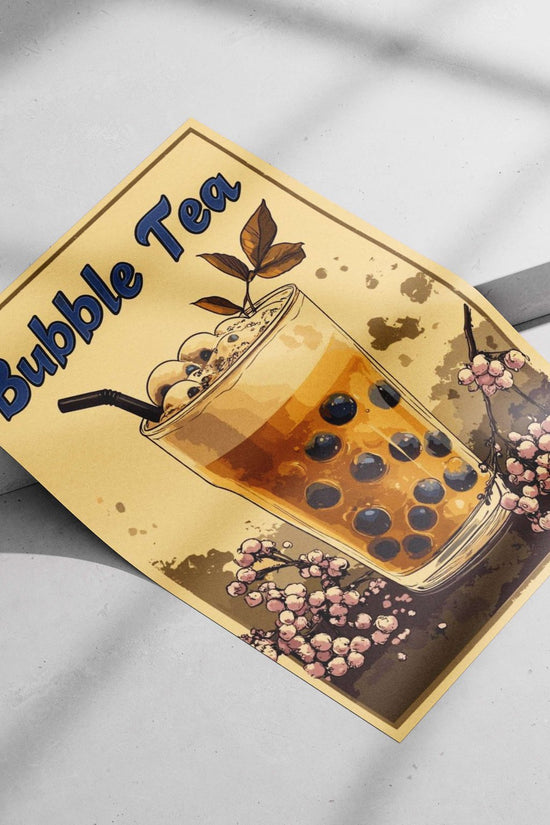 Bubble Tea (specifically a glass of bubble tea with boba pearls, tapioca balls, and decorative leaves) Main Subject: Bubble