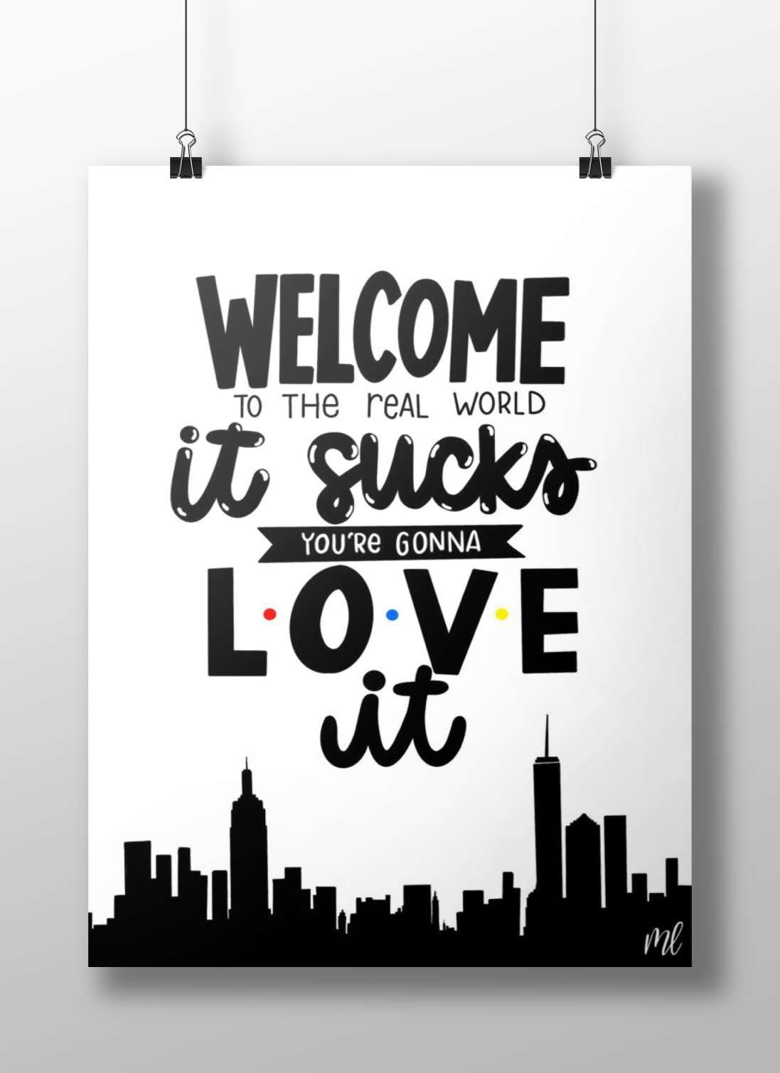 The motivational text phrase "WELCOME TO THE REAL WORLD it sucks YOU'RE GONNA LOVE it" Main Subject: The motivational text