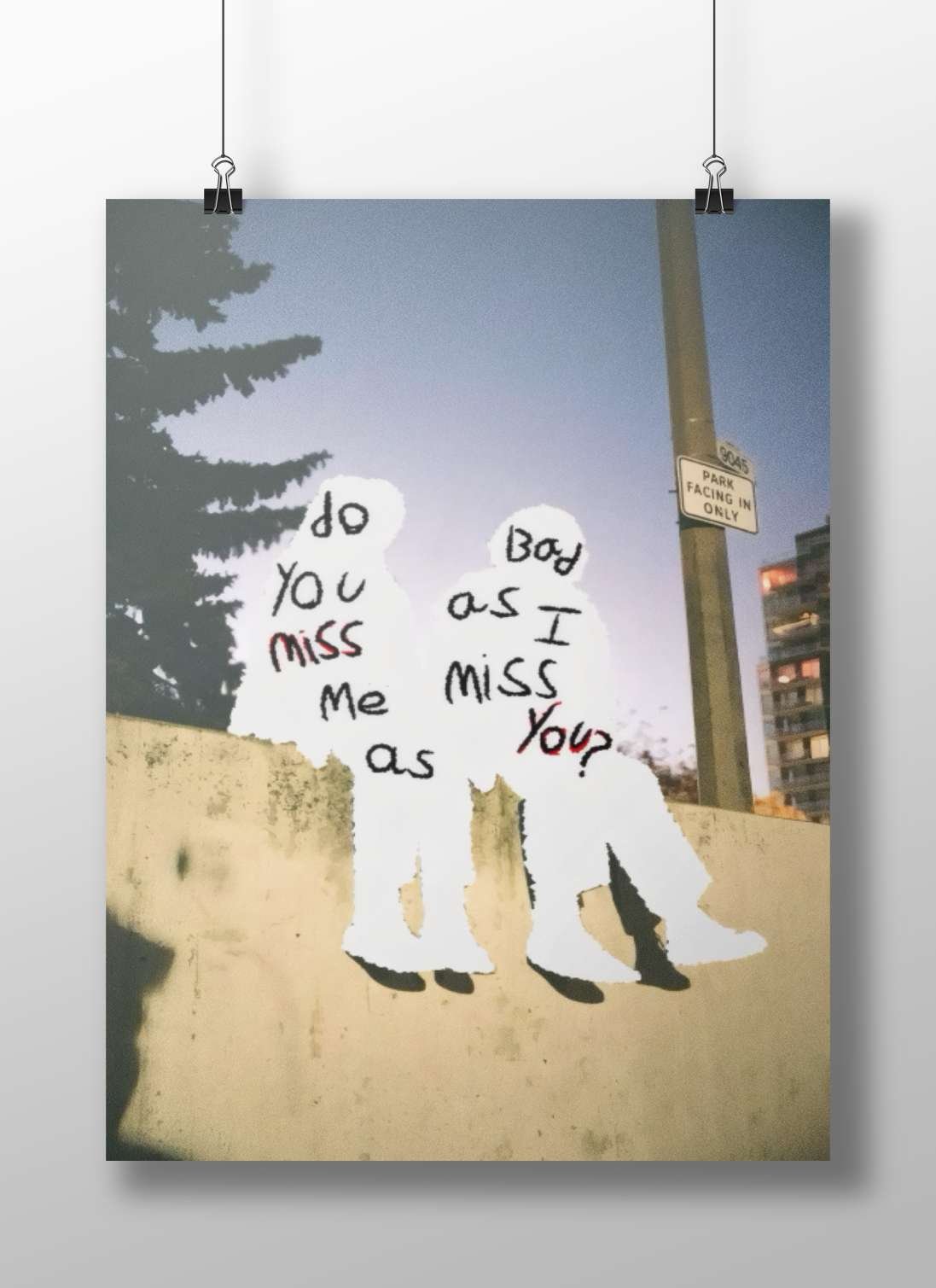 the phrase "do you miss me as I miss you?" written on two human silhouettes Main Subject: the phrase "do you miss me as I
