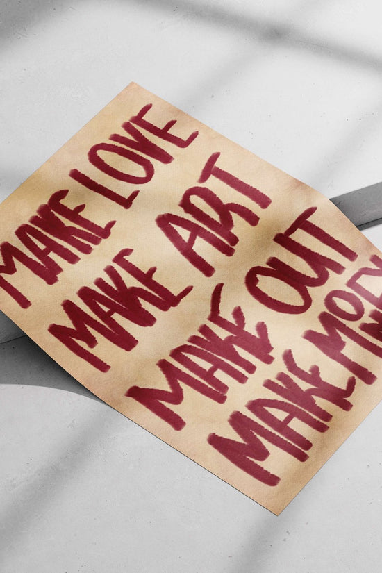 Four hand-painted phrases "MAKE LOVE", "MAKE ART", "MAKE OUT", "MAKE MONEY" Main Subject: Four hand-painted phrases "MAKE