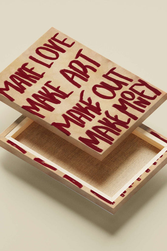 Four hand-painted phrases "MAKE LOVE", "MAKE ART", "MAKE OUT", "MAKE MONEY" Main Subject: Four hand-painted phrases "MAKE