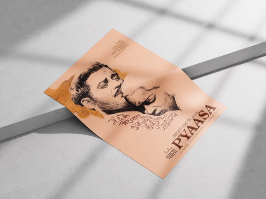 Book titled 'PYAASA' with a portrait on a light background. Minimalist sepia-toned Pyaasa movie poster with a sketch of Guru Dutt and Waheeda Rehman, styled in a thin wood frame.