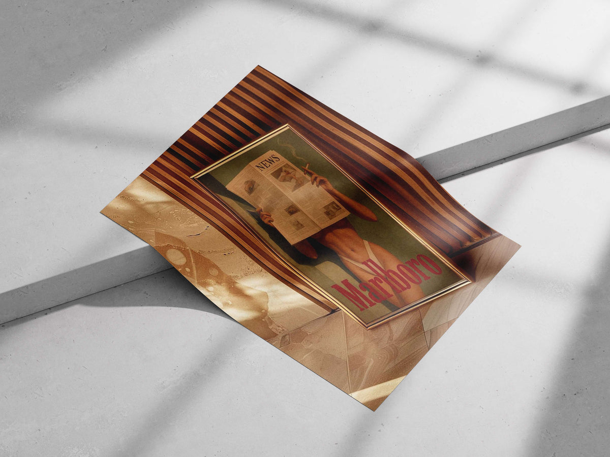 Framed vintage tobacco advertisement poster featuring a nude figure holding newspaper over face with cigarette
