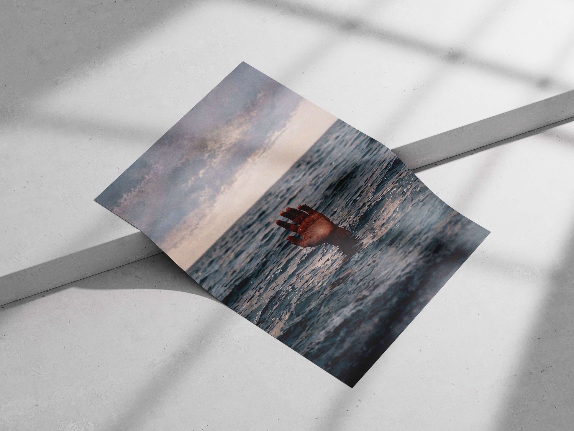 Human hand emerging from ocean water Main Subject: Human hand emerging from ocean water Matte poster print — Art wall art