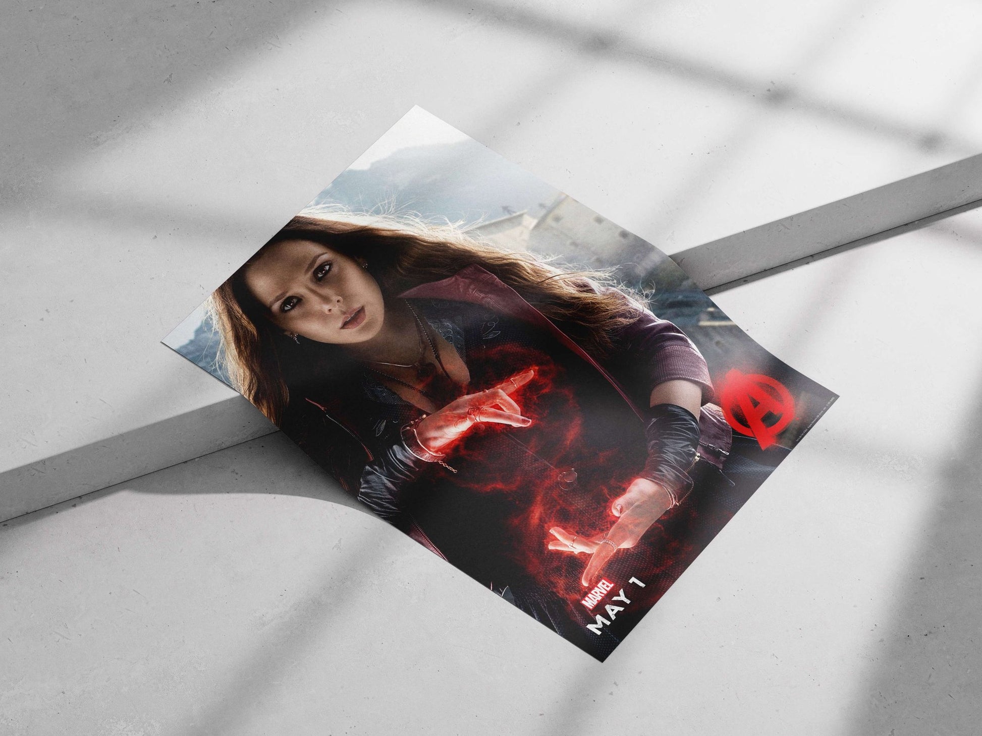 Wanda Maximoff (Scarlet Witch) from Marvel's Avengers franchise (confirmed by "MARVEL" logo and Avengers "A"