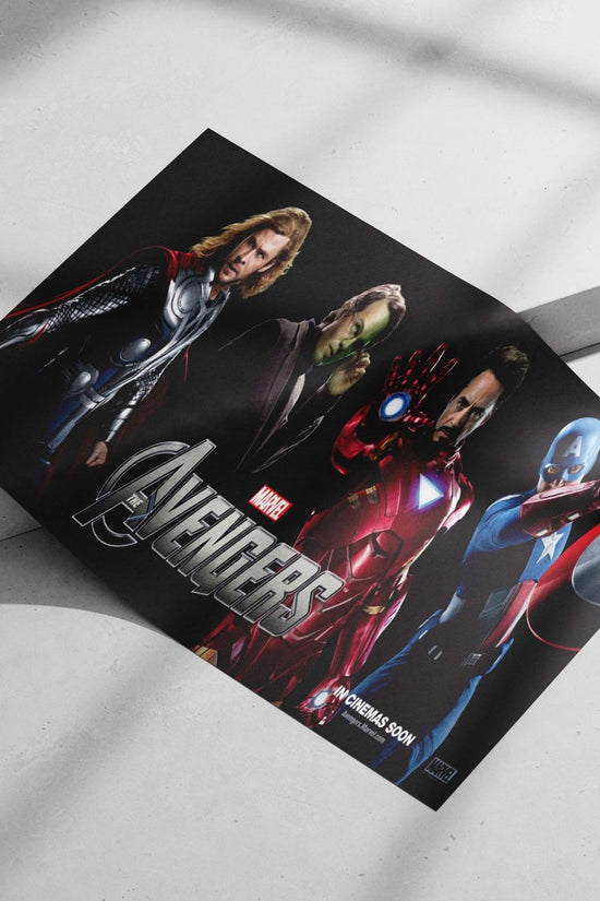 Thor (Chris Hemsworth), Tony Stark/Iron Man (Robert Downey Jr.), Steve Rogers/Captain America (Chris Evans), and