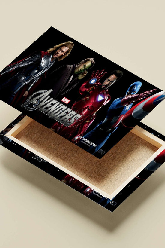 Thor (Chris Hemsworth), Tony Stark/Iron Man (Robert Downey Jr.), Steve Rogers/Captain America (Chris Evans), and