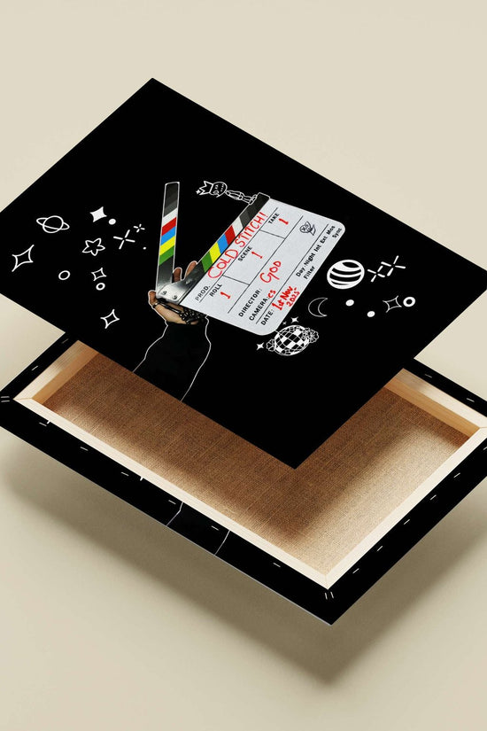 Clapperboard displaying "COLD STITCH!" project name and "Ggod" (deity) as director. Main Subject: Clapperboard displaying