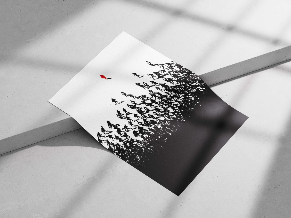 A lone red silhouette standing above a crowd of black walking silhouettes Main Subject: A lone red silhouette standing above