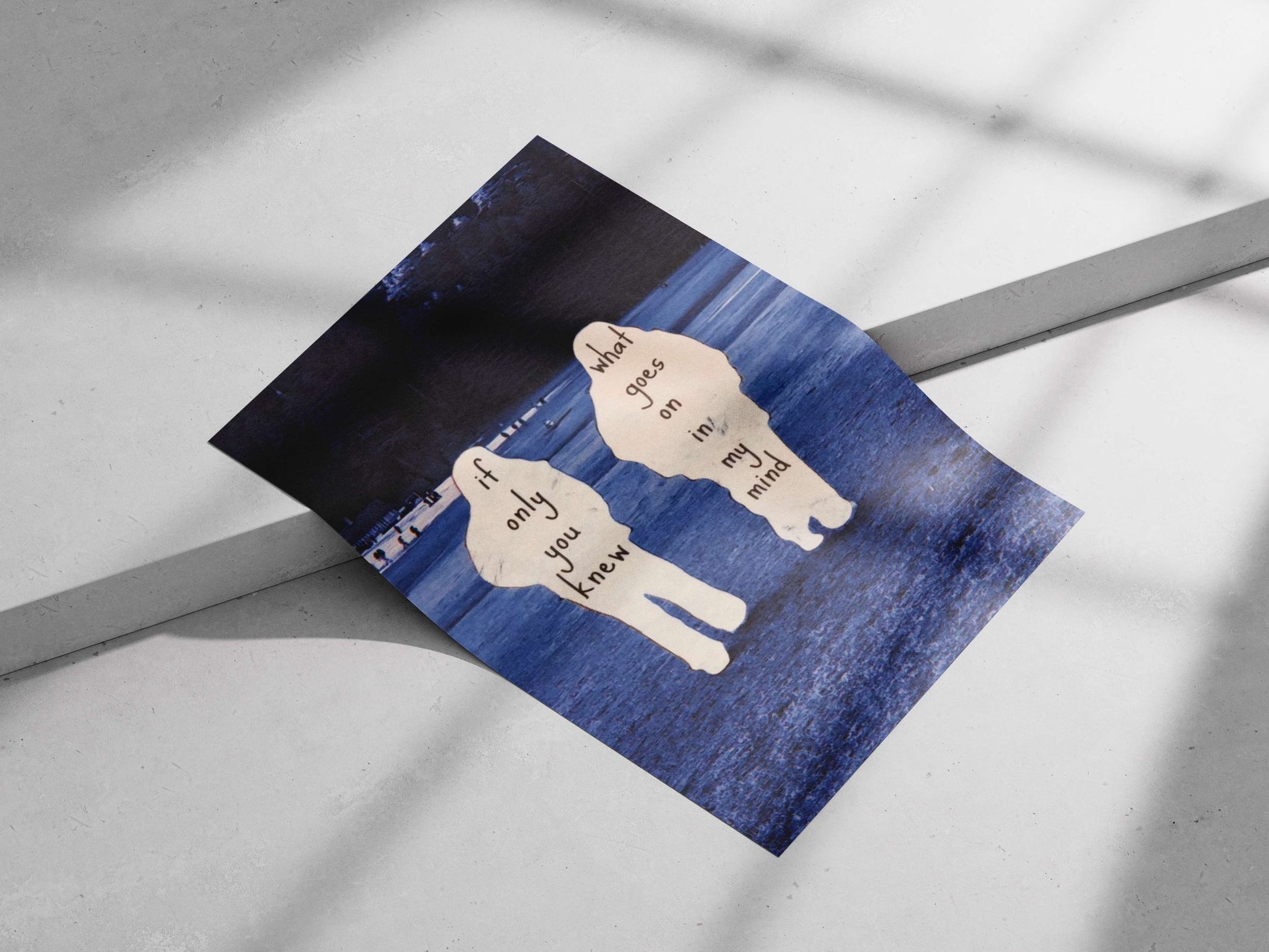 Two human-shaped cutouts with the inscribed phrases "if only you knew" and "what goes on