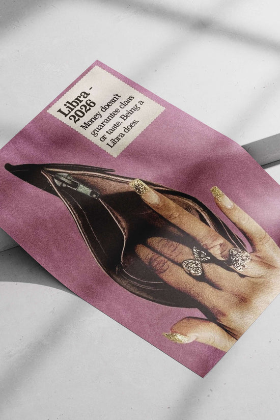 Black stiletto shoe held by a hand with gold-glitter nail extensions Hand-Held Black Stiletto Shoe