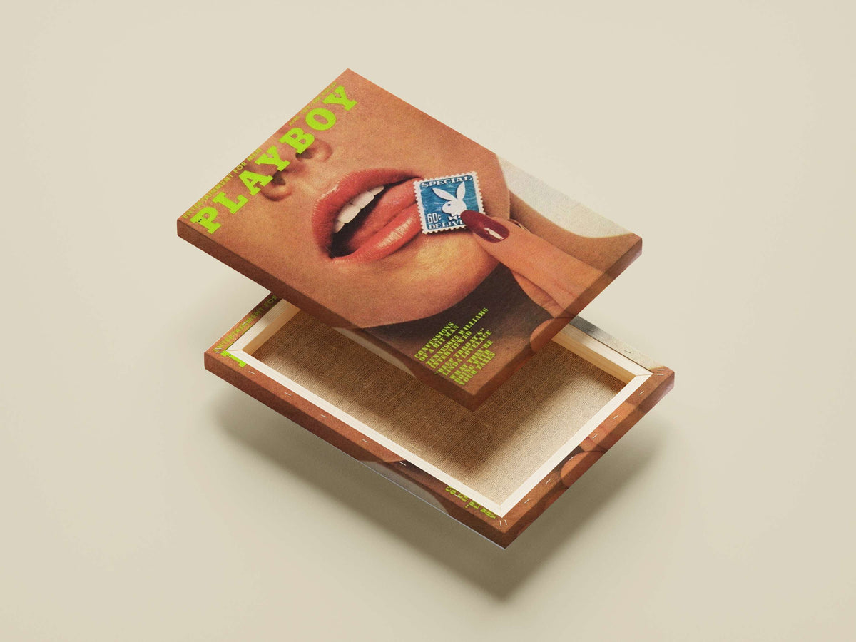 Close-up of a person's face with a hand holding a Playboy-branded stamp near the lips,