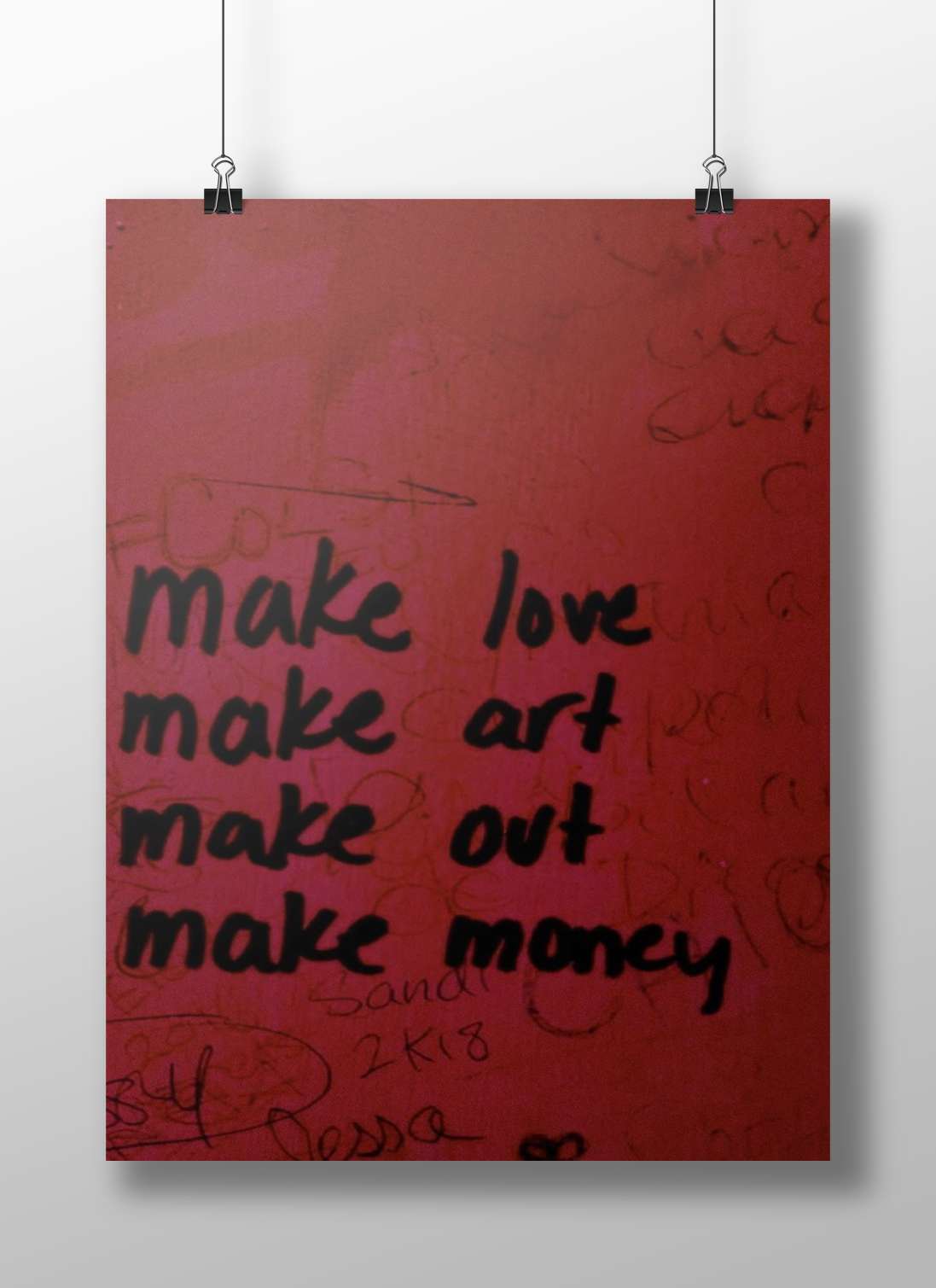 hand-painted motivational graffiti wall art with phrases "make love, make art, make out, make money"
