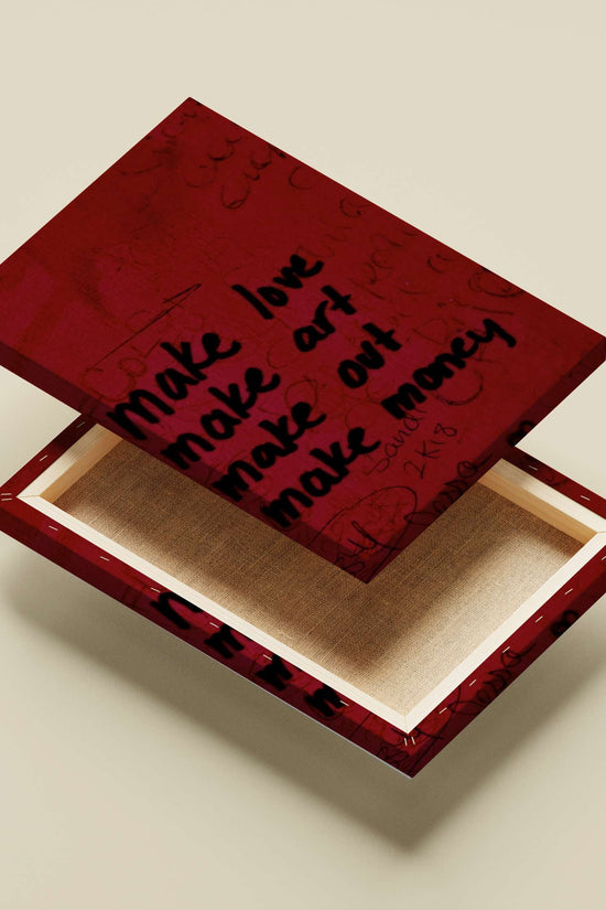 hand-painted motivational graffiti wall art with phrases "make love, make art, make out, make money"