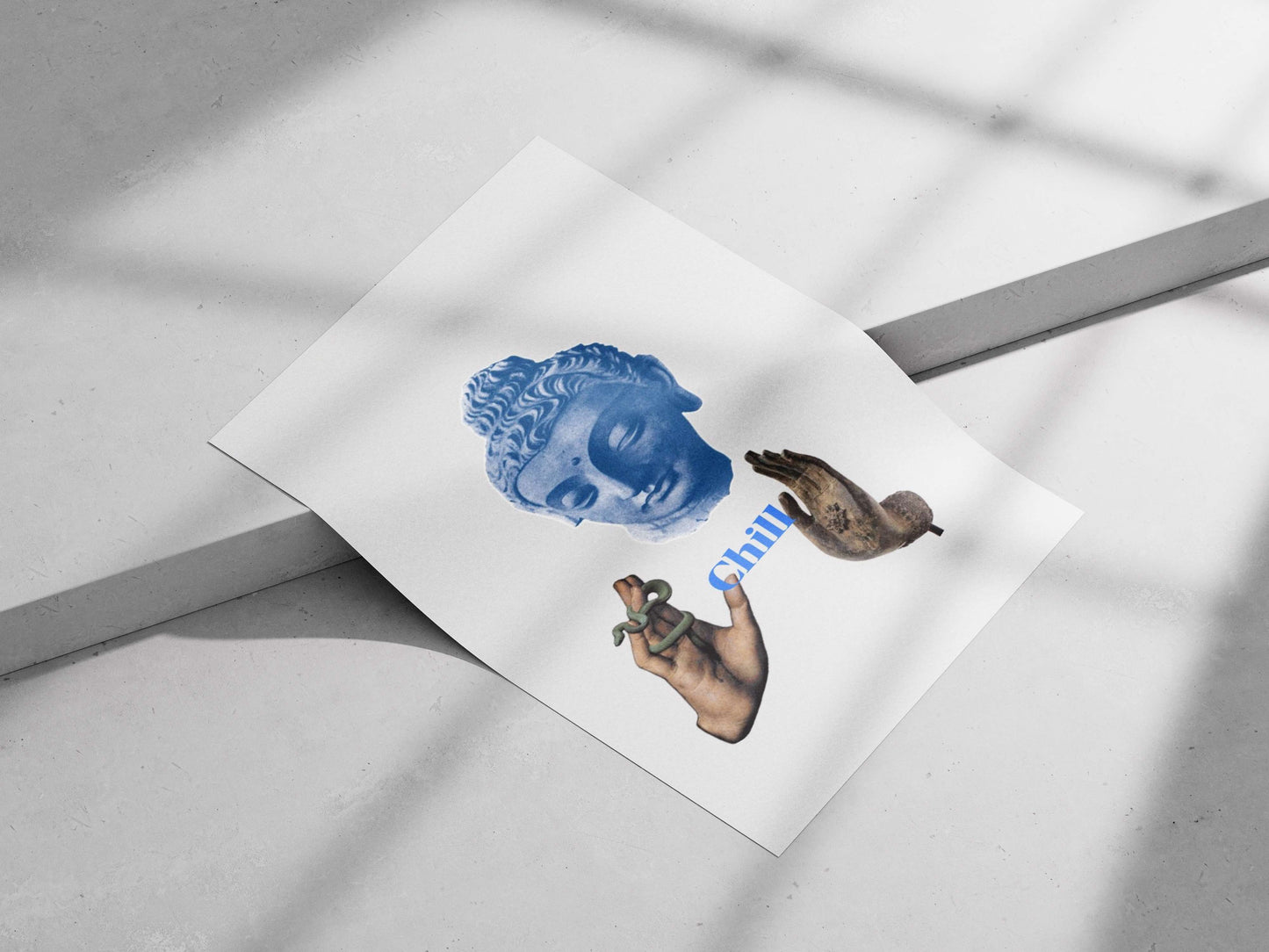 Blue-toned stone Buddha head sculpture with accompanying hands (one holding a snake, one raised in