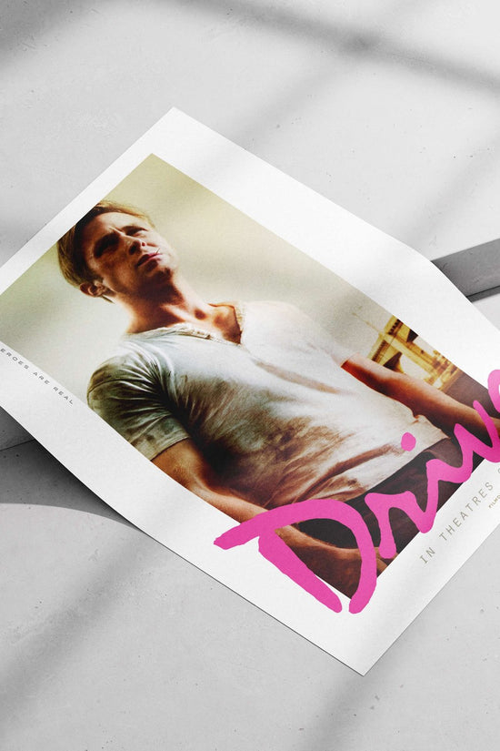 Drive (the film by Nicolas Winding Refn, confirmed by "FILMDISTRICT [R" as distributor/rating text) Nick