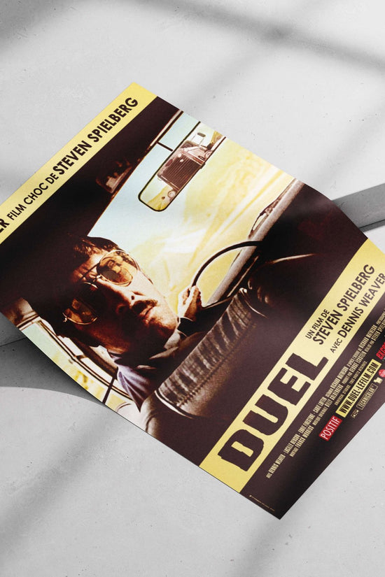 The movie "Duel" directed by Steven Spielberg, starring Dennis Weaver (confirmed by Tesseract OCR text