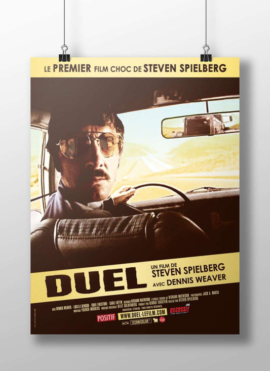 The movie "Duel" directed by Steven Spielberg, starring Dennis Weaver (confirmed by Tesseract OCR text