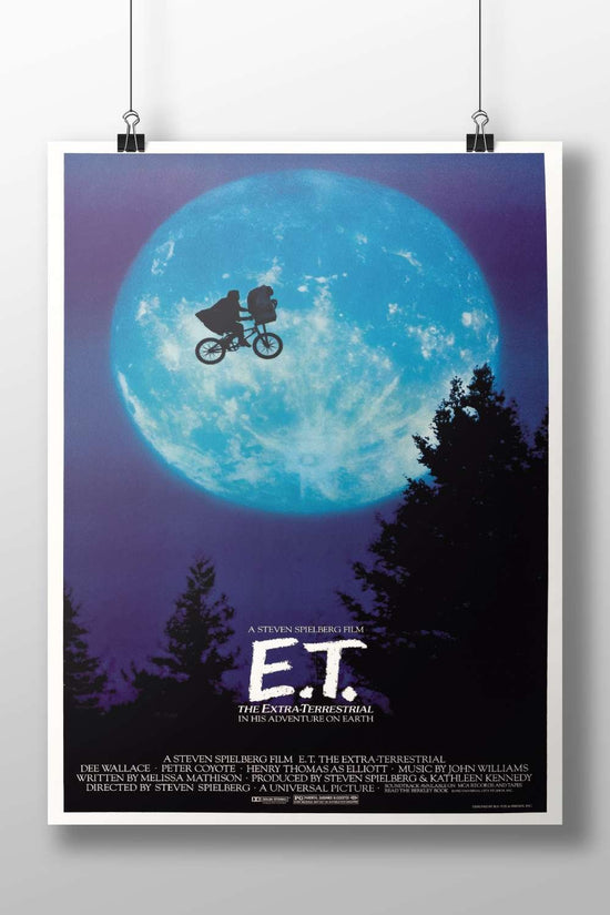 E.T. the Extra-Terrestrial (film franchise, featuring Elliott (Henry Thomas) and E.T. on a bicycle) Elliott