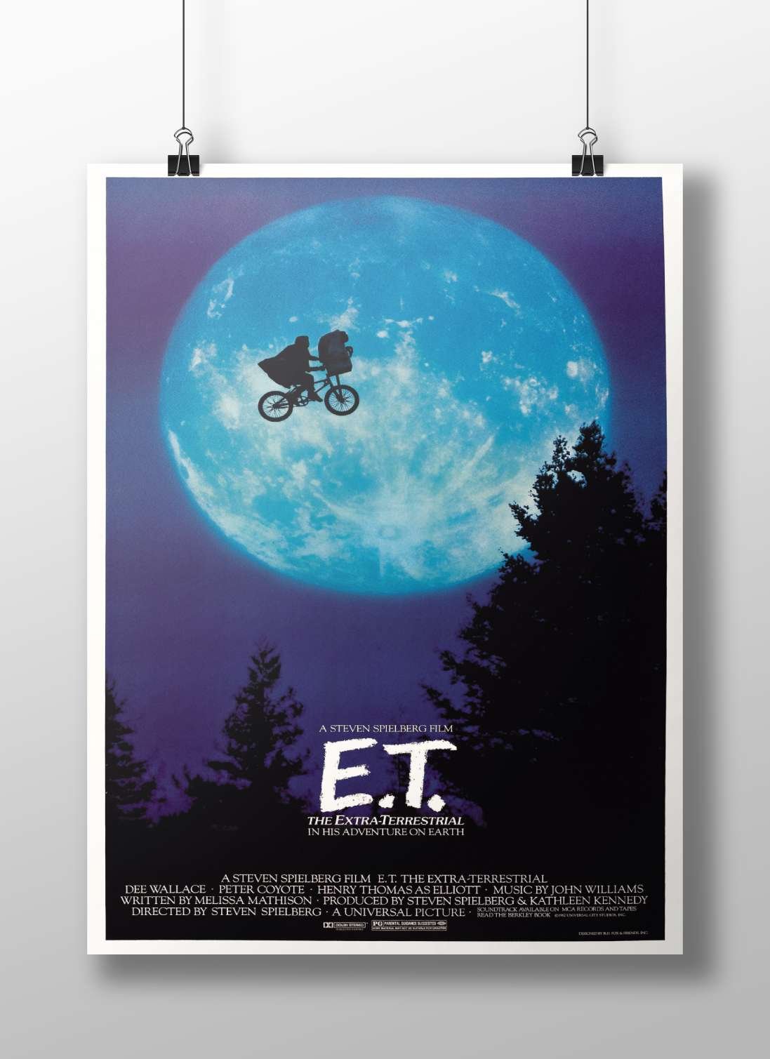 E.T. the Extra-Terrestrial (film franchise, featuring Elliott (Henry Thomas) and E.T. on a bicycle) Elliott