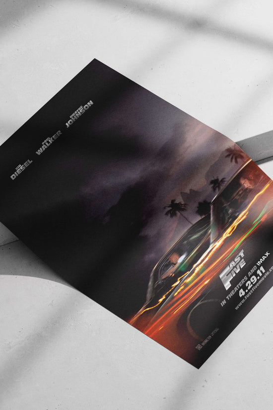 Fast Five (movie) from the Fast & Furious franchise, starring Vin Diesel, Paul Walker, and