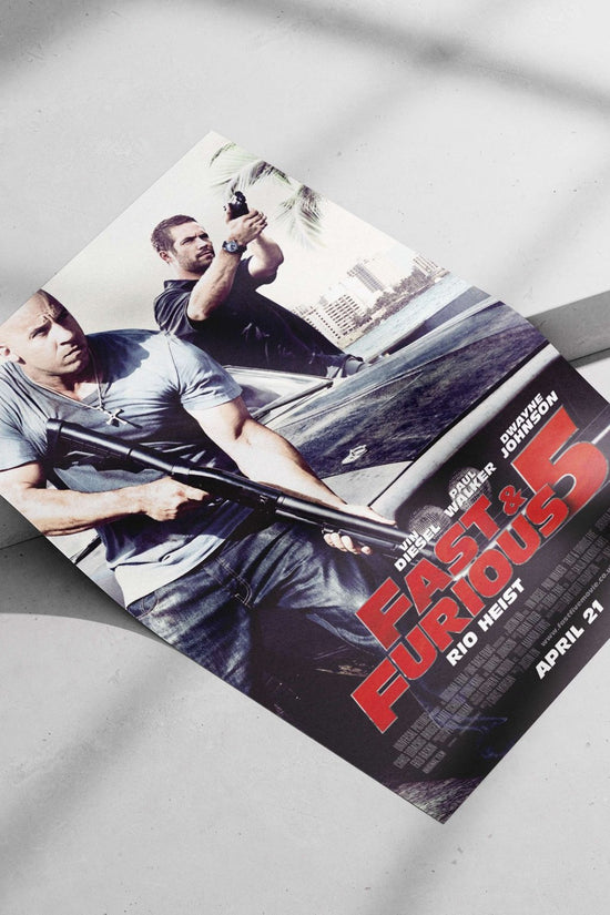 Fast & Furious 5 (confirmed by "APRIL 21" release date OCR text). Dominic Toretto -