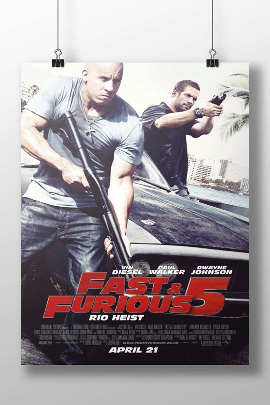 Fast & Furious 5 (confirmed by "APRIL 21" release date OCR text). Dominic Toretto -
