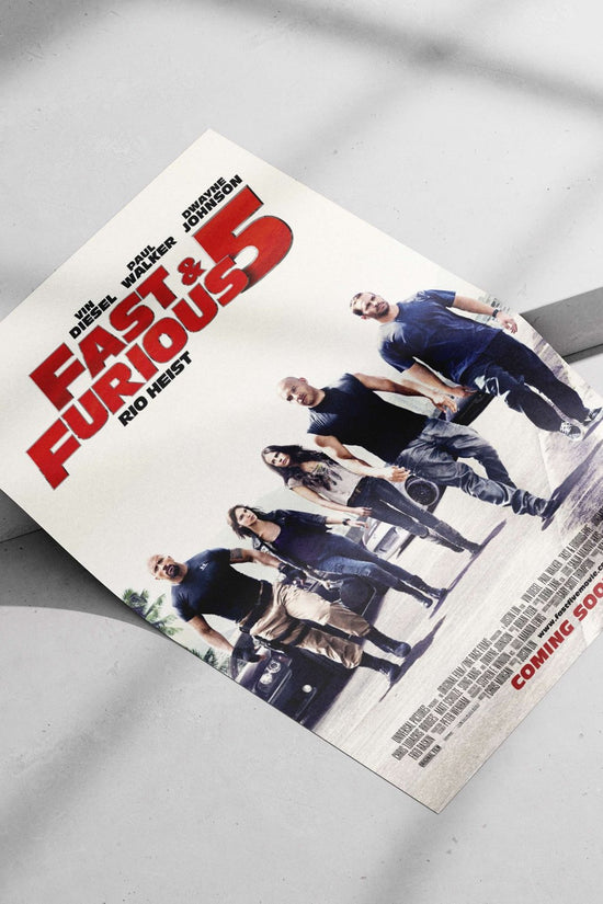 The film "Fast & Furious 5: Rio Heist" starring Vin Diesel, Paul Walker, and Dwayne