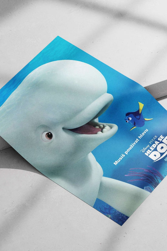 Dory (blue tang fish) and a beluga whale character from Disney•Pixar's Finding Dory Dory &
