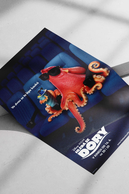 Hank (red octopus) and Dory (blue fish), characters from Disney-Pixar's "Finding Dory" franchise. Main Subject: Hank (red