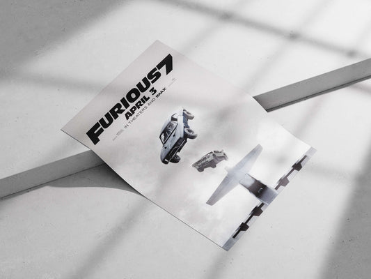 Fast & Furious franchise's "Furious 7" film featuring Dodge Charger and GMC Sierra car models. Main Subject: Fast & Furious