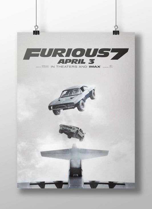 Fast & Furious franchise's "Furious 7" film featuring Dodge Charger and GMC Sierra car models. Main Subject: Fast & Furious