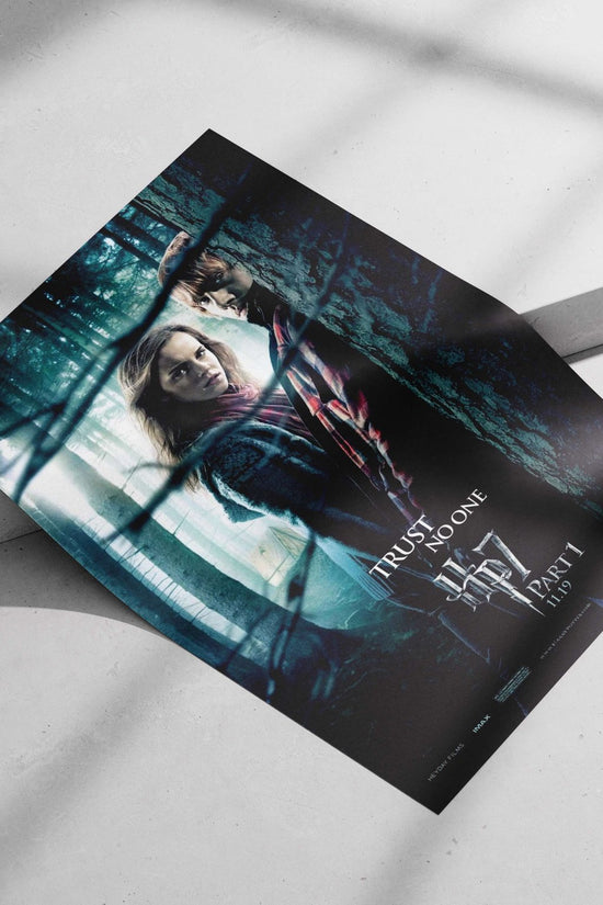 Harry Potter franchise (featuring Hermione Granger and Ron Weasley in "Harry Potter and the Deathly Hallows Part 1" poster)