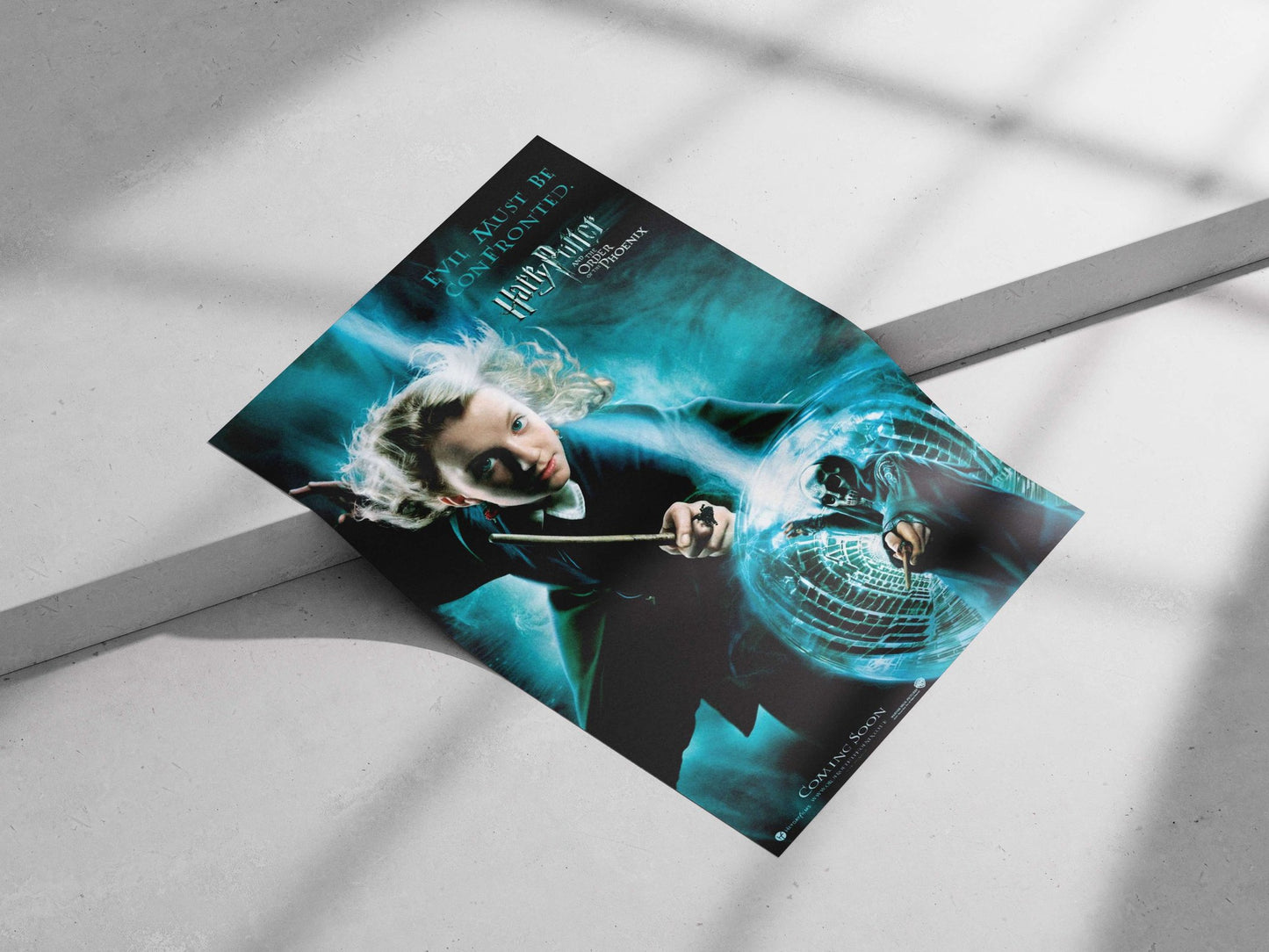 The Harry Potter franchise's "Harry Potter and the Order of the Phoenix" movie poster. Main Subject: The Harry Potter