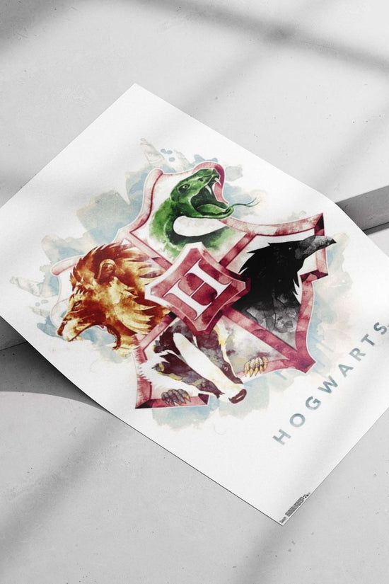 Hogwarts School crest (Gryffindor lion, Slytherin green serpent, Hufflepuff badger, Ravenclaw eagle) from the Harry Potter