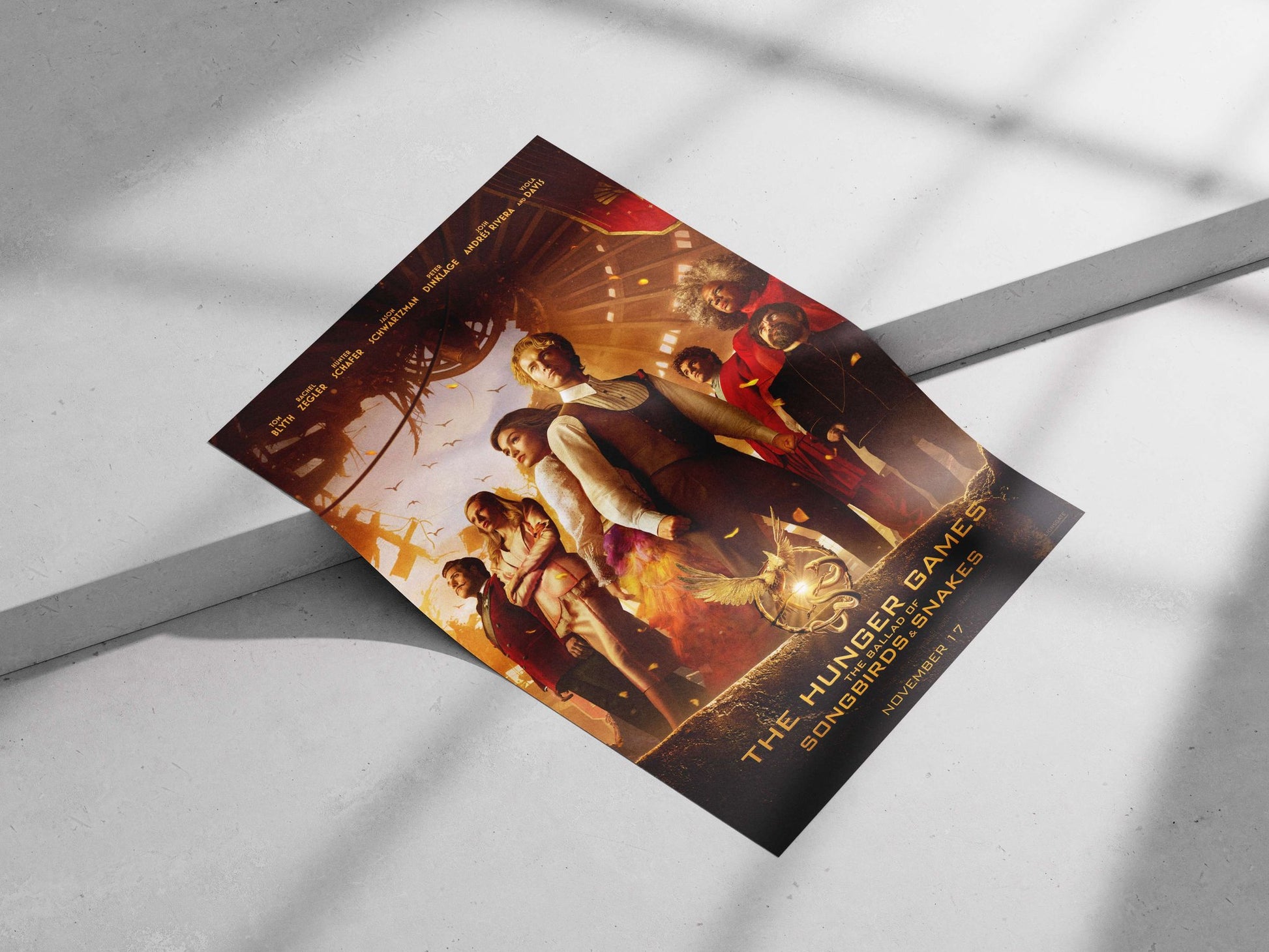 The Hunger Games franchise, specifically "The Ballad of Songbirds & Snakes" (movie title). Main Subject: The Hunger Games