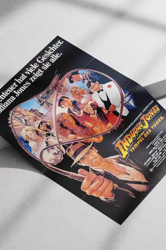 Indiana Jones franchise (specifically the 1980s film "Indiana Jones und der Tempel des Todes"). Main Subject: Indiana Jones