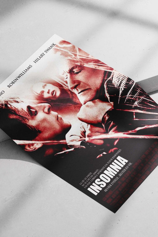 The movie poster for "Insomnia" starring Al Pacino, Robin Williams, and Hilary Swank. Main Subject: The movie poster for