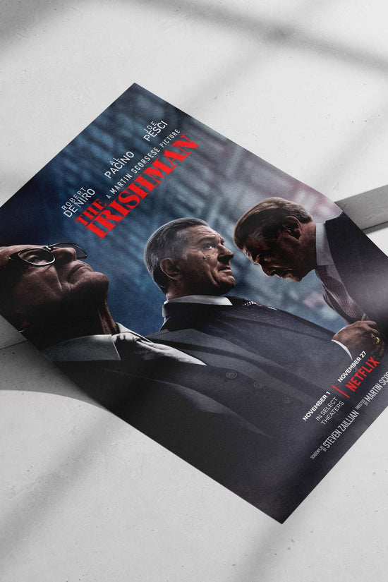 The movie poster for "The Irishman," starring Robert De Niro, Al Pacino, and Joe Pesci. Main Subject: The movie poster for