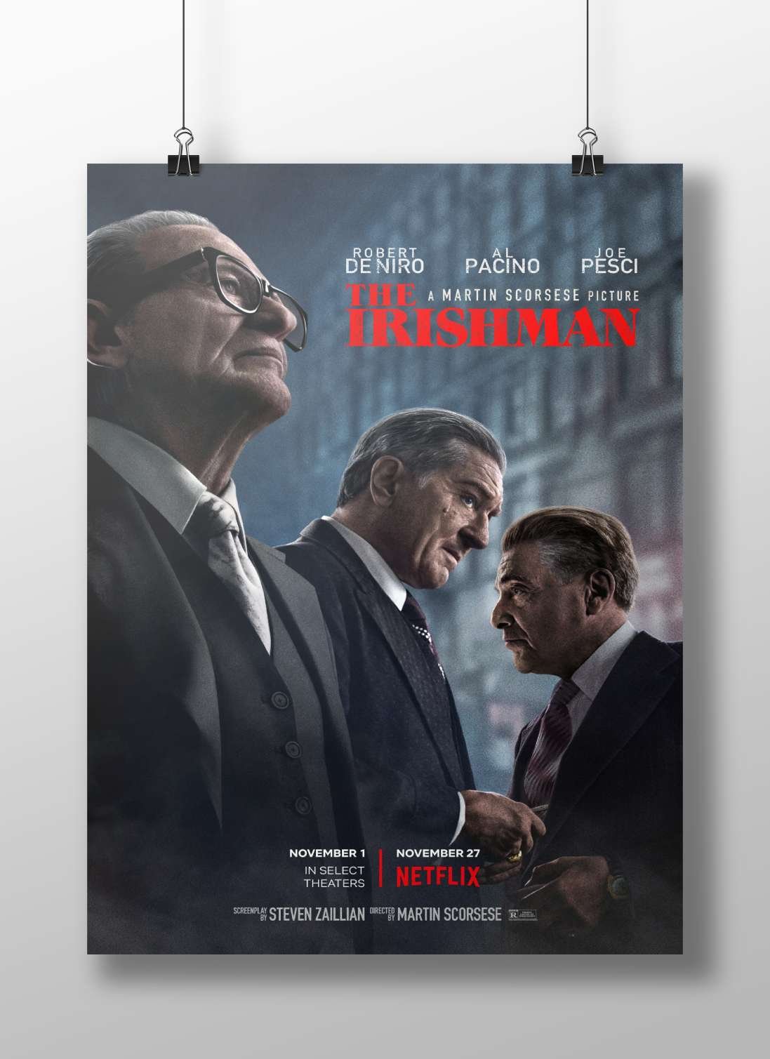 The movie poster for "The Irishman," starring Robert De Niro, Al Pacino, and Joe Pesci. Main Subject: The movie poster for