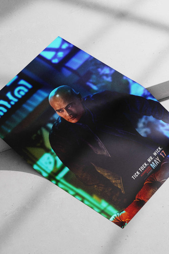 John Wick (from the John Wick franchise, specifically *John Wick: Chapter 3 – Parabellum*) Main Subject: John Wick (from the