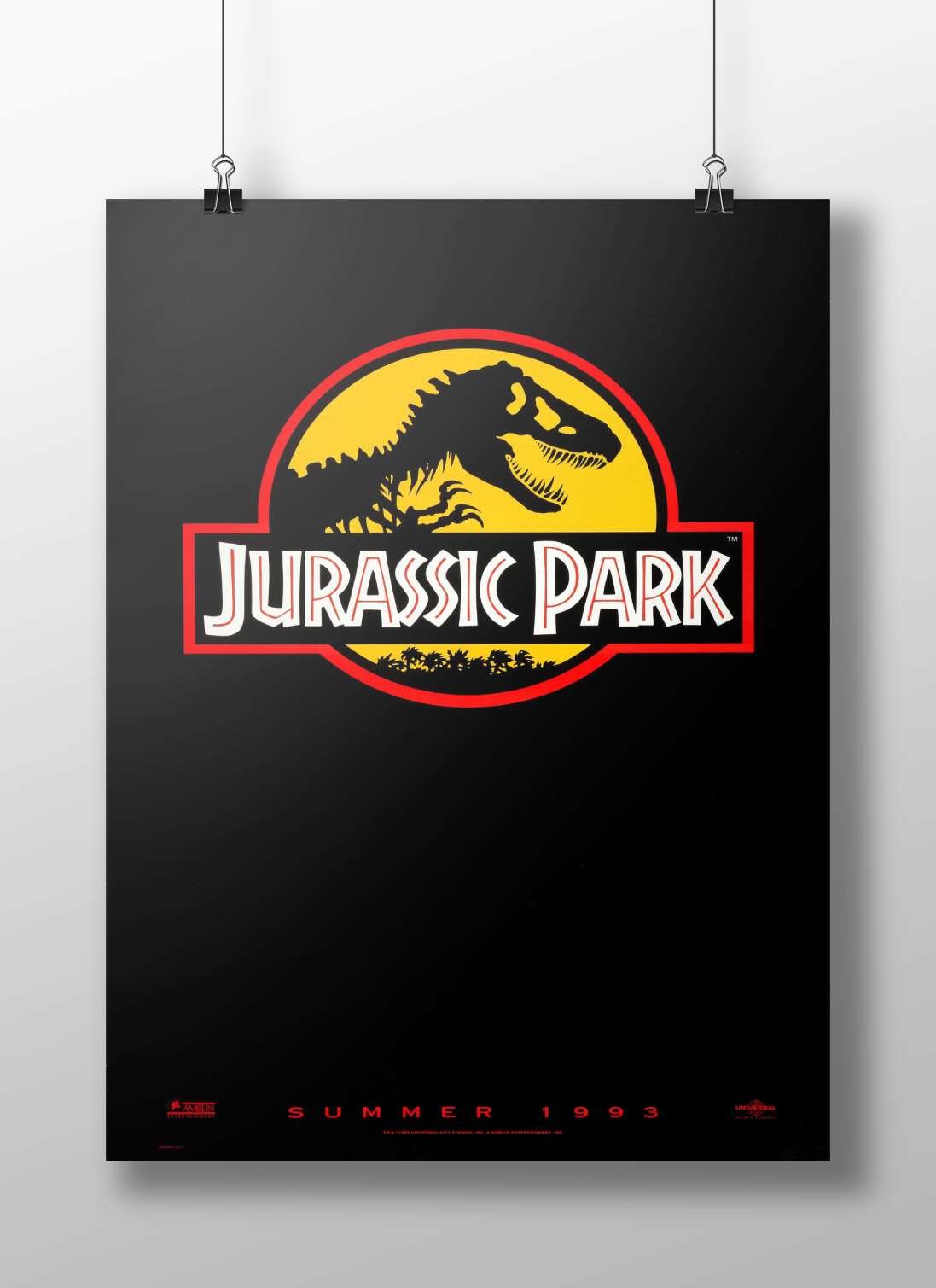 The Jurassic Park franchise logo, featuring a Tyrannosaurus Rex silhouette. Main Subject: The Jurassic Park franchise logo,