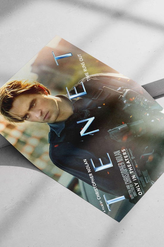 Robert Pattinson in the film Tenet (Christopher Nolan franchise) Tenet - Time Bends Poster