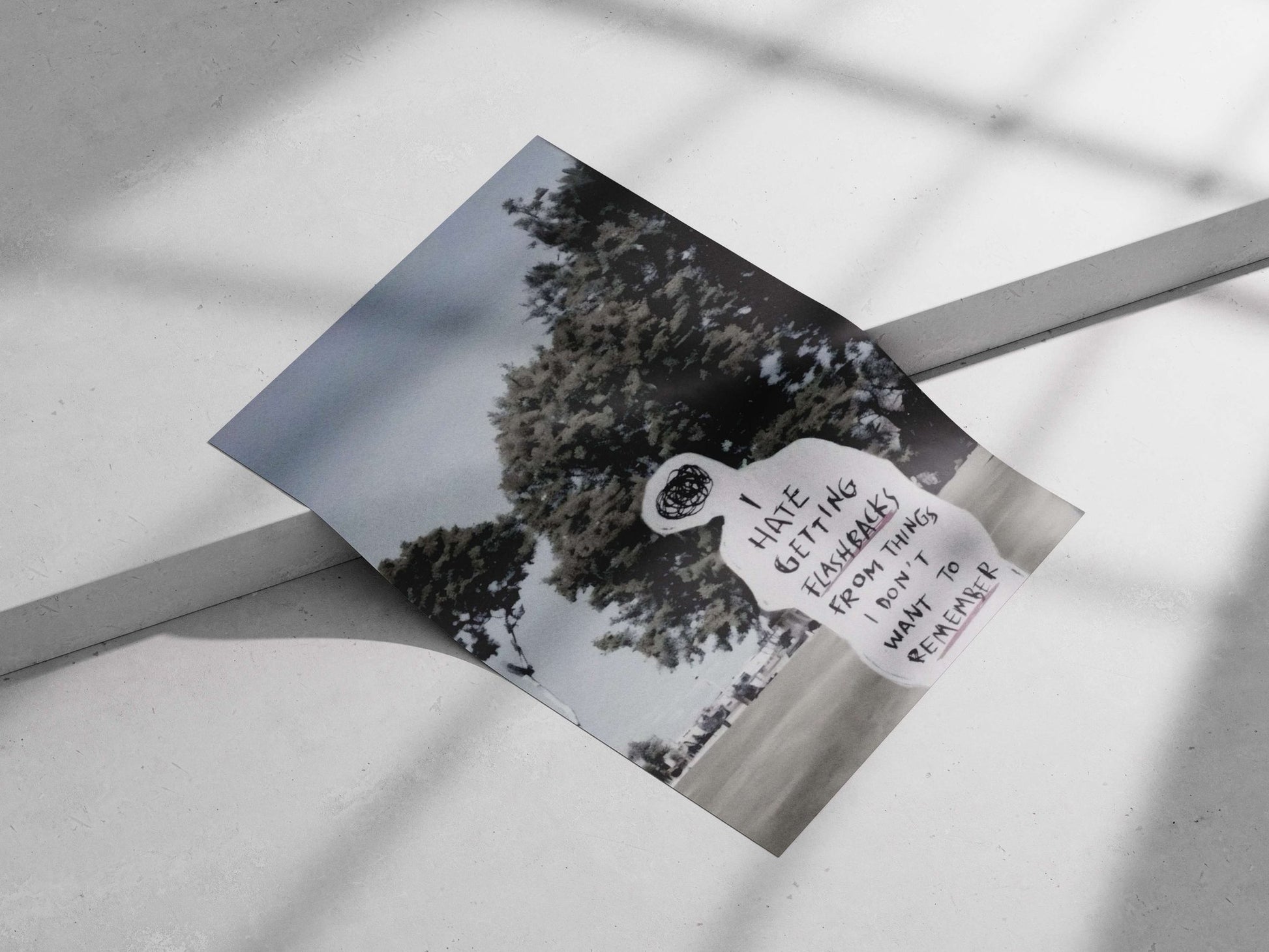 Human-shaped paper cutout with handwritten text about flashbacks Main Subject: Human-shaped paper cutout with handwritten