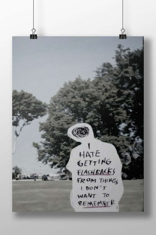 Human-shaped paper cutout with handwritten text about flashbacks Main Subject: Human-shaped paper cutout with handwritten